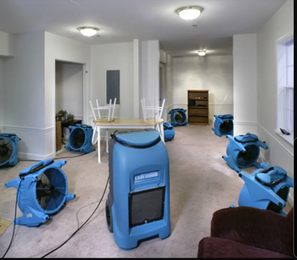 Air movers and dehumidifier setup for Water Damage Restoration in Marblehead